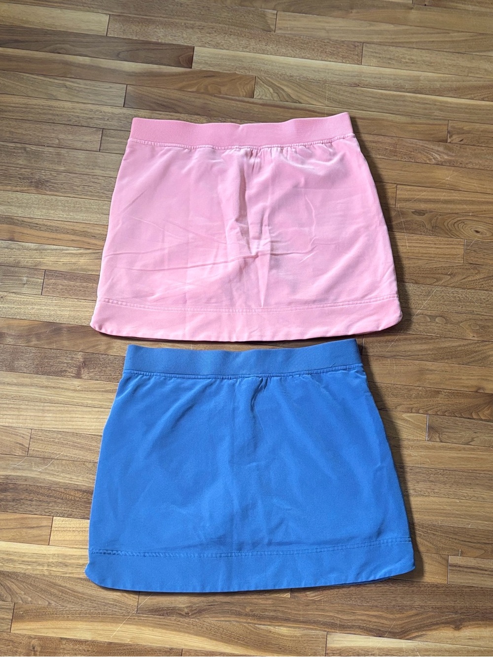 32 Degrees peach and blue golf skirts